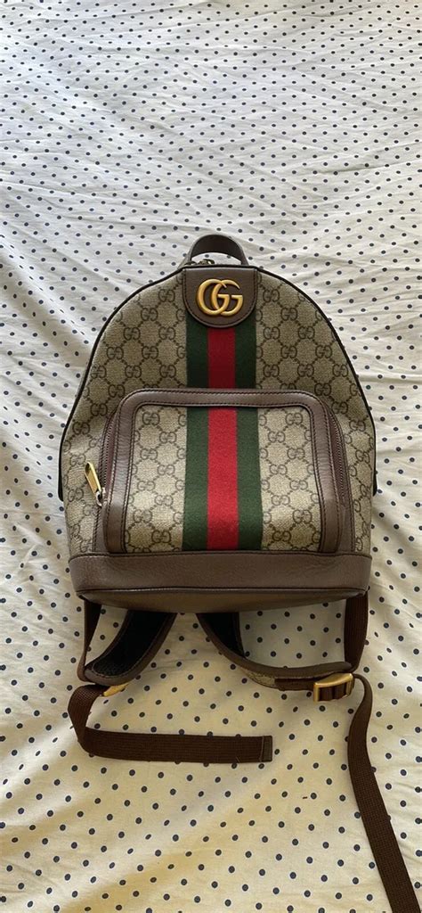 gucci collins st hours|Gucci backpacks near me.